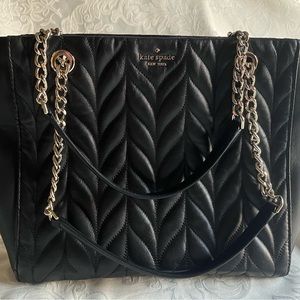 Kate Spade quilted Satchel with gold straps and logo.  Center zipped section.